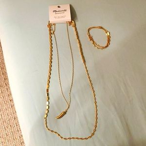 Gold necklace and bracelet set.